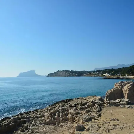 Mobile In Jean Near Sea *