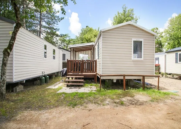 Mobile In Jean Near Sea *